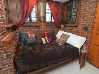 Full-size futon  located in semi-private bay window niche located in living room
